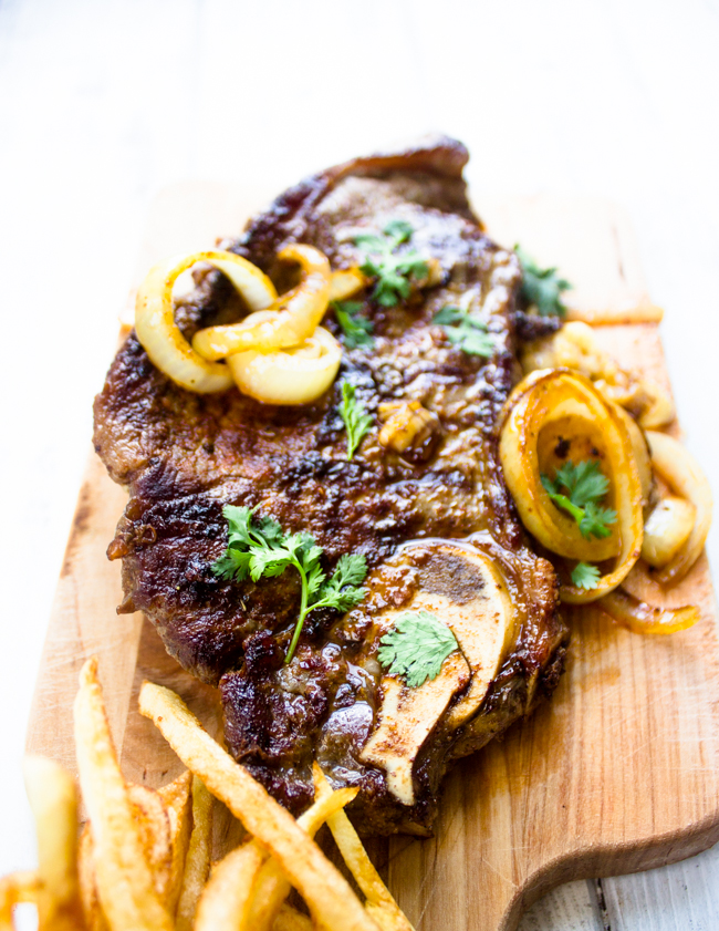Pan Seared New York Strip Steak with Garlic Butter Sauce + Onions