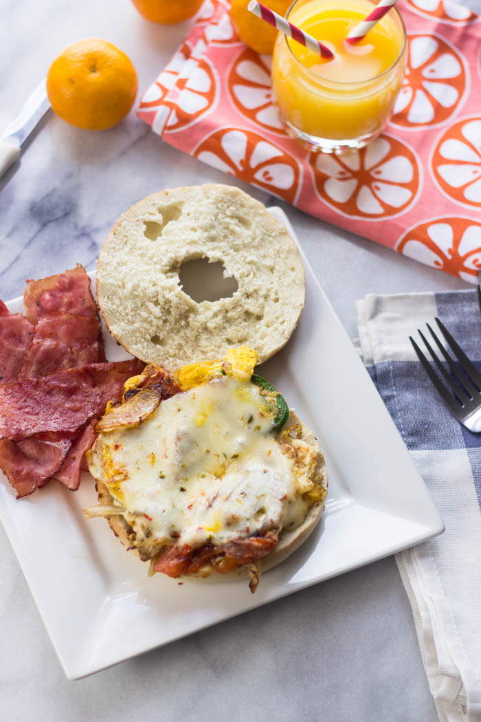 Easy Pastrami, Egg & Cheese on A Bagel with Sautéed Onions & Jalapeño