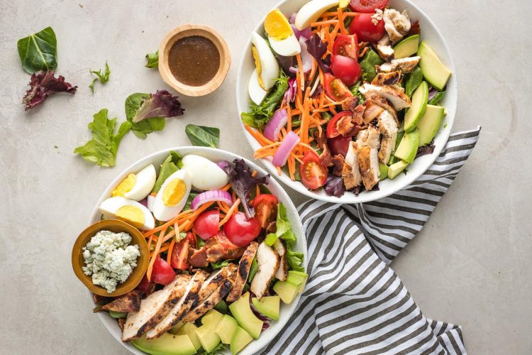 Grilled chicken layered on top.