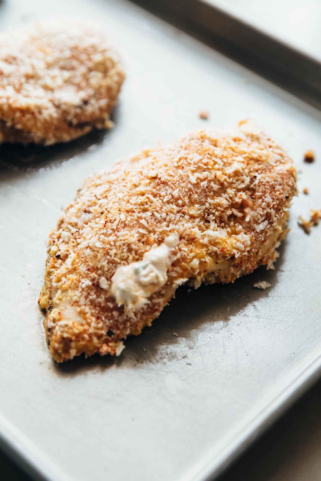 Jalapeno popper stuffed chicken baked and straight out of the oven