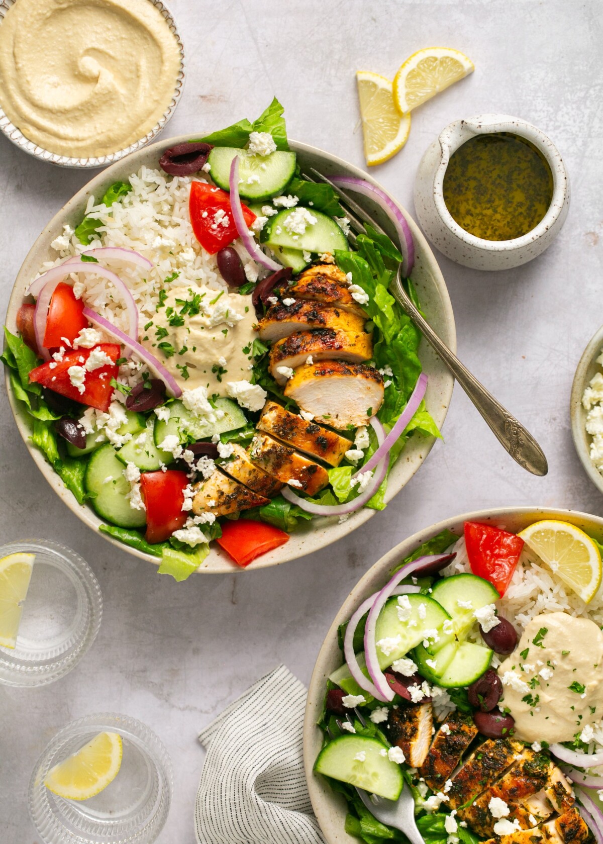 Mediterranean chicken bowls on a white background