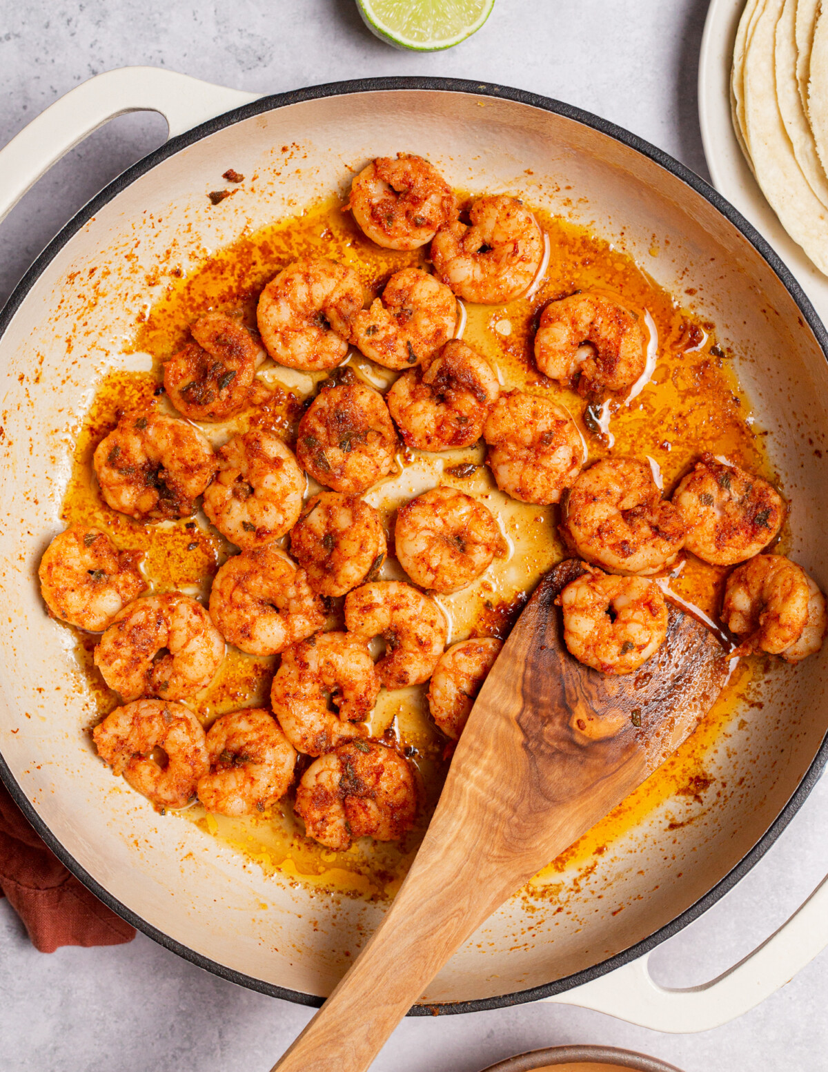Cooking shrimp in a skillet.